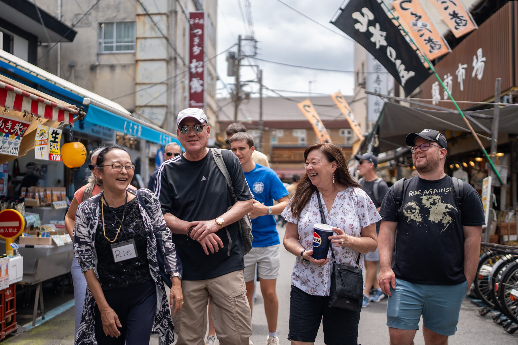 Guide leading guests through a historic Tokyo site